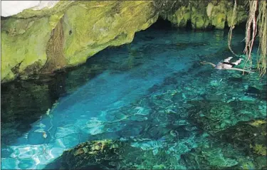  ?? POSTMEDIA NEWS ?? The Grand is one of the largest cenotes, winding around a small tropical island before sliding into caverns.