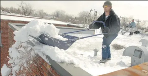  ?? JOHN MORSTAD/ THE GAZETTE ?? Although snow on the roof of your home can indicate how well your attic insulation is working, too much snow can cause your roof to collapse.