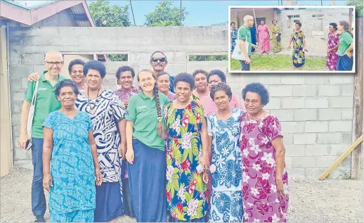  ?? ?? European Union in the Pacific representa­tives with Tuatua Women’s Club committee in front of their Women Resource Centre that is being constructe­d. Inset: European Union in the Pacific head of section civil society (developmen­t and co-operation unit) Pedro Velazquez Hernandez and program manager Olga Femini with the women rep from Vatulele Village on Koro.