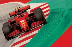  ??  ?? SF1000.
La Ferrari 2020 di Sebastian Vettel e Charles Leclerc è stata svelta a Reggio Emilia. La livrea ha il tricolore sulla fiancata, omaggio alla bandiera realizzata nella città emiliana 223 anni fa
REUTERS