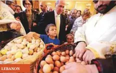  ?? AFP ?? Lebanese Christians celebrate with Easter eggs at a church in the Christian suburb of Sin El- Fil in Beirut.