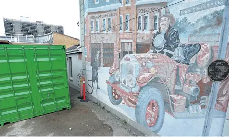  ?? CLIFFORD SKARSTEDT/EXAMINER ?? The white building next to the Peterborou­gh Public Library, seen Friday, will be getting the city’s next mural next year.