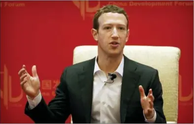  ?? ASSOCIATED PRESS ?? In this 2016, file photo, Facebook CEO Mark Zuckerberg speaks during a panel discussion in Beijing. Facebook was born in a bubble and grew up coddled for years with little regulation, lots of reverence and unchecked growth that has made it into a...