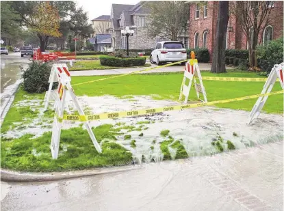  ?? Courtesy of resident Karen St. Denis ?? Water spews out of a ruptured line in the 5200 block Grand Lake Street in Bellaire in January. Nearby waterline work and the fragility of old cast-iron water lines most likely led to the problem. Many lines are 70 years old.