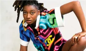  ?? Photograph: Jameela Elfaki/The Observer ?? Right on track: Little Simz wears shirt and shorts, both by chanel.com.