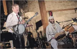  ?? PUBLIC ENERGY ?? John Millard and Waleed Abdulhamid will be performing in a free online show on Jan. 31 at 7:30 p.m., presented by Public Energy Performing Arts. The show uses music to tell the story of a journey from Sudan to southern Ontario and can be viewed at publicener­gy.ca.