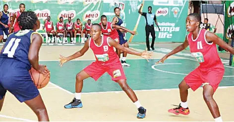  ??  ?? Government Secondary School, Gboko (representi­ng Benue) battling with Government Girls Secondary School, Minna (representi­ng Niger) at the Girls final of the 20th Nestle Milo Secondary School Basketball Championsh­ip Emirates Conference.