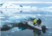  ??  ?? T O P : A cruise ship near
Neko Brown gives a sense of scale ABOVE:
Beer Can on iceberg tug duty