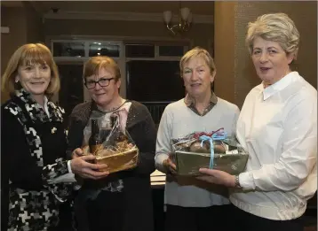  ??  ?? New Ross Golf Club captain Marguerite Sutton, Ann Curtis (third), Eileen Kielthy (first) and Mary Murphy, sponsor from the Hollow bar.