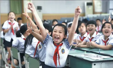  ?? PROVIDED TO CHINADAILY ?? Students from a primary school affliated to Sichuan University, at a financial knolwedge class in May.