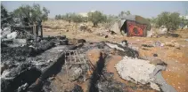  ?? EPA ?? The burnt-out structures at the site the US special forces raided in which the ISIS founder died