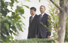  ?? Getty Images ?? President Obama and President Xi Jinging meet Friday.