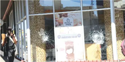  ??  ?? Damages at Chicken Inn at Julius Nyerere Cnr Robson Manyika after the rowdy MDC-A Alliance mob went into the streets on Wednesday protesting election results. — (Picture by Memory Mangombe)