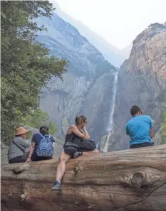  ?? RON HOLMAN/VISALIA TIMES-DELTA ?? Lower Yosemite Falls is just one of the landmark vistas that was obscured by smoke in late July from the Ferguson Fire blazing in Yosemite National Park in California.