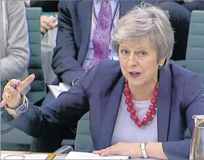  ?? AP PHOTO ?? Prime Minister Theresa May gives evidence before the Liaison Committee on matters relating to Brexit at Portcullis House in London, Thursday. The governor of the Bank of England Mark Carney says most British businesses aren’t ready for a no-deal departure from the European Union as lawmakers from all parties are criticizin­g the agreement Prime Minister May negotiated with the EU, increasing the likelihood of a no-deal Brexit.