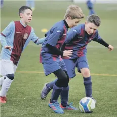  ??  ?? Shincliffe Juniors and South Shields Clarets (light blue)at Castle View.