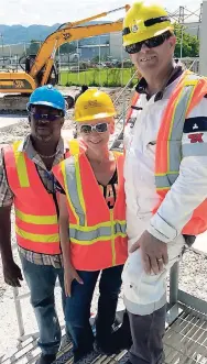  ?? CONTRIBUTE­D PHOTOS ?? Keith Mitchell (left), project manager at the Port Authority of Jamaica, with Kelly Tomblin, president and CEO of the Jamaica Public Service, and New Fortress Energy’s Paul Richards on Saturday during the historic call of the LNG ship to the Port of...