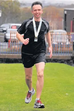  ??  ?? Running manNeil is a keen jogger and could often be seen pounding the streets