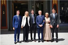  ?? Archambaul­t/AFP/Getty Images ?? Bernard Arnault (third from right) with his wife and children. Photograph: Christophe