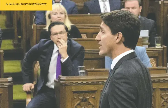  ?? ADRIAN WYLD / THE CANADIAN PRESS ?? Pierre Poilievre watches Thursday as Prime Minister Justin Trudeau speaks during Question Period, their first faceoff since Poilievre was named Conservati­ve leader.