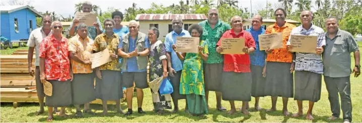  ?? Photo: Office of the Prime Minister ?? Prime Minister Voreqe Bainimaram­a (seventh from left) in Bua on January 14, 2021, with Pine Group chair Ratu Wiliame Katonivere (green shirt) and Minister for Disaster Management Inia Seruiratu (far right).