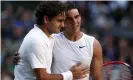  ?? Photograph: POOL/Reu ?? Rafael Nadal is embraced by Roger Federer after the Spaniard’s victory in an epic five-set Wimbledon final in 2008 that ended in semi-darkness.