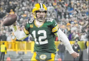  ?? Morry Gash The Associated Press ?? QB Aaron Rodgers has not yet announced his plans for next season, but the four-time MVP could have interst in Las Vegas because of Davante Adams.