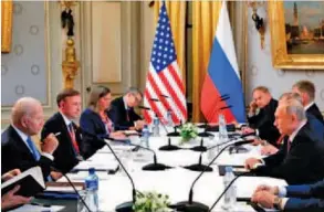  ?? MIKHAIL METZEL/AP ?? U.S President Joe Biden, left, and Russian President Vladimir Putin, right, talk during their meeting at the ‘Villa la Grange’ in Geneva, Switzerlan­d in Geneva, Switzerlan­d, Wednesday, June 16, 2021.