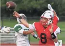  ?? C.T. KRUGER / NOW NEWS GROUP ?? Homestead’s Jack Riebau, shown earlier this season against Port Washington, threw three TD passes against Grafton on Friday.