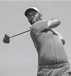  ?? EDUARDO VERDUGO/AP ?? Jon Rahm tees off at the fourth hole during the final round of the Mexico Open on Sunday at Vidanta in Puerto Vallarta, Mexico.