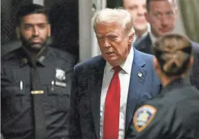 ?? POOL PHOTO BY ANGELA WEISS VIA GETTY IMAGES ?? Former President Donald Trump arrives at his trial for allegedly covering up a hush money payment linked to an extramarit­al affair, at Manhattan Criminal Court in New York City, on Thursday.