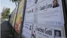  ??  ?? Death notices on a billboard line an empty street in Alzano Lombardo, near Bergamo