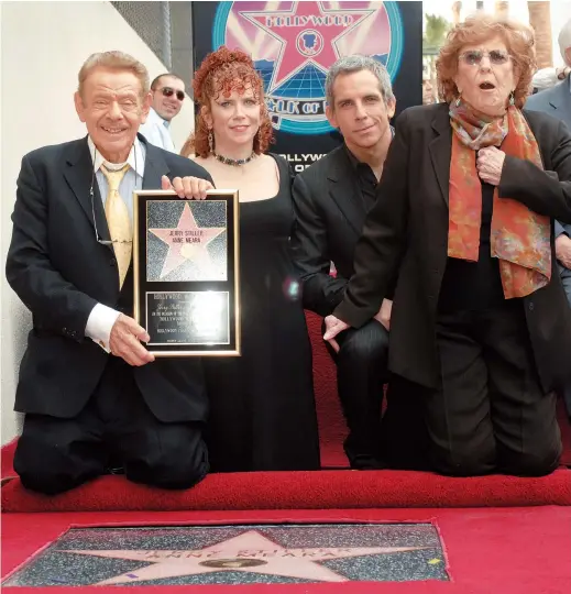  ??  ?? Jerry Stiller (left) and his wife Anne Meara (right) pose with their children Amy and Ben for pictures at a ceremony where the parents are honored with a star on the Hollywood Walk of Fame in Los Angeles, California, on February 9, 2007. — Reuters