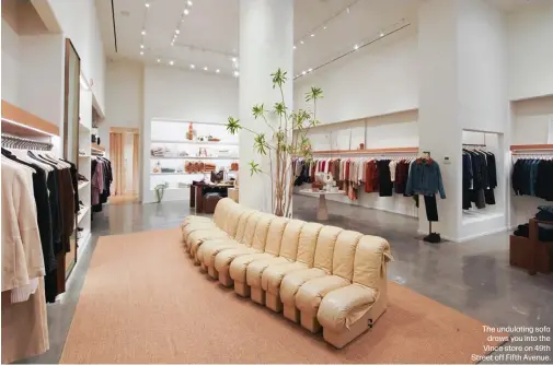  ??  ?? The undulating sofa
draws you into the Vince store on 49th Street off Fifth Avenue.