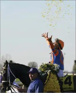  ?? DARRON CUMMINGS — THE ASSOCIATED PRESS ?? Jockey Irad Ortiz Jr. celebrates after riding Forte to victory during the Breeders’ Cup Juvenile at Keeneland Race Course last November. Forte has won five of his six starts.