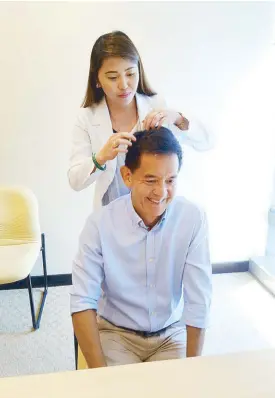  ??  ?? The first step of any Svenson consultati­on is hair analysis by one of the trained specialist­s, a trichologi­st. And no, not a kutohuntin­g session. Here, they check dryness of scalp and the state of one’s follicles and roots.
