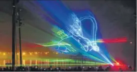  ?? ANIL K MAURYA, SHEERAZ RIZVI/HT ?? ▪ An image of Lord Ram created through laser beam atop the tent city of Magh Mela as part of a waterlaser show on the banks of Sangam in Allahabad on Thursday.