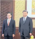  ?? REUTERS ?? HK’s John Lee poses with President Xi Jinping in Beijing on Friday.