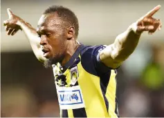  ??  ?? Bolt celebrates scoring a goal for A-League football club Central Coast Mariners in his first competitiv­e start for the club against Macarthur South West United in Sydney in this Oct 12 file photo. — AFP photo