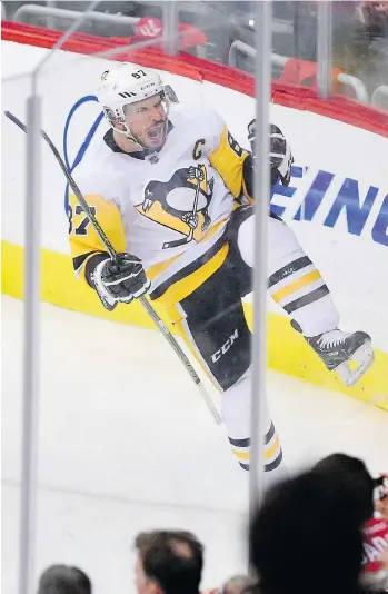  ?? NICK WASS/THE ASSOCIATED PRESS ?? Sidney Crosby scored the tying goal and set up the winner a few minutes later as the Pittsburgh Penguins came from behind to score a 3-2 win over the Capitals in Game 1 Thursday.