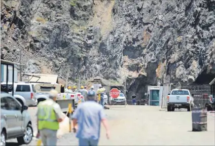  ??  ?? Going under: Lily Mine near Barberton, where rescue teams failed to retrieve a container with three people in it after it was buried during a collapse, faces liquidatio­n. Photo: Gallo Images/Beeld/Felix Dlangamand­la