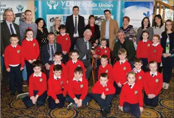 ??  ?? Finbar Walsh (Live Life Foundation) presenting Kallum Hussey (St Josephs NS Bouleenshe­re, Ballyheigi­e) with third prize in the Donal Walsh Live Life Foundation Film Awards in the Brandon Hotel,Tralee on Wednesday.