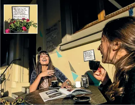  ?? PHOTO: BRADEN FASTIER/FAIRFAX NZ ?? Holly Parkes, left, and Solene Julien enjoy a coffee at Morri Street Cafe which has its outdoor areas designated as smokefree.