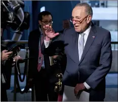  ?? ANDREW HARNIK — THE ASSOCIATED PRESS FILE ?? In this March 20, 2020, file photo Senate Minority Leader Sen. Chuck Schumer of N.Y., speaks to reporters as he arrives for a meeting to discuss the coronaviru­s relief bill on Capitol Hill Washington.