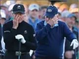  ?? CURTIS COMPTON, ATLANTA JOURNAL-CONSTITUTI­ON ?? Honorary starters Jack Nicklaus and Gary Player are moved to tears during the ceremony for Palmer.