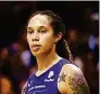  ?? Ross D. Franklin / Associated Press ?? Phoenix Mercury center Brittney Griner pauses on the court during the second half of a WNBA game against the Seattle Storm in 2019 in Phoenix.