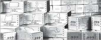  ??  ?? Pictured left reveals for the very first time the valuable .999 pure fine silver bars inside each State Silver Vault Brick. Pictured right are the State Silver Vault Bricks containing the only U.S. State Silver Bars known to exist with the double...