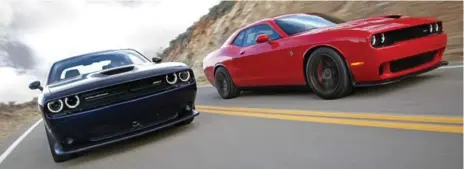  ?? FCA US LLC/CHRYSLER ?? Unlike its ancestor, today’s Dodge Challenger has a supercharg­er. Other muscle cars, like Camaros and Mustangs, carry turbo four-cylinder engines.