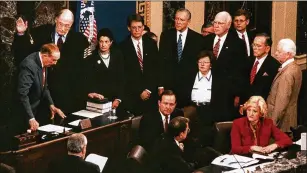  ?? ASSOCIATED PRESS / U.S. SENATE ?? Sen. Strom Thurmond, R-S.C., (left) swears in Chief Justice William Rehnquist to preside over the impeachmen­t trial of President Clinton in January 1999. There are rules from the 1980s about how to run a Senate trial, but they’re intentiona­lly vague on key points, and some of it may depend on how the trial is overseen by the current chief justice, John Roberts.