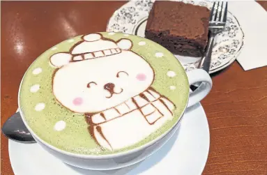  ?? KARON LIU PHOTOS TORONTO STAR ?? While latte art, like this bear on matcha latte at Himalayan Coffee House, is for the Instagram age, it’s also a smart business strategy.